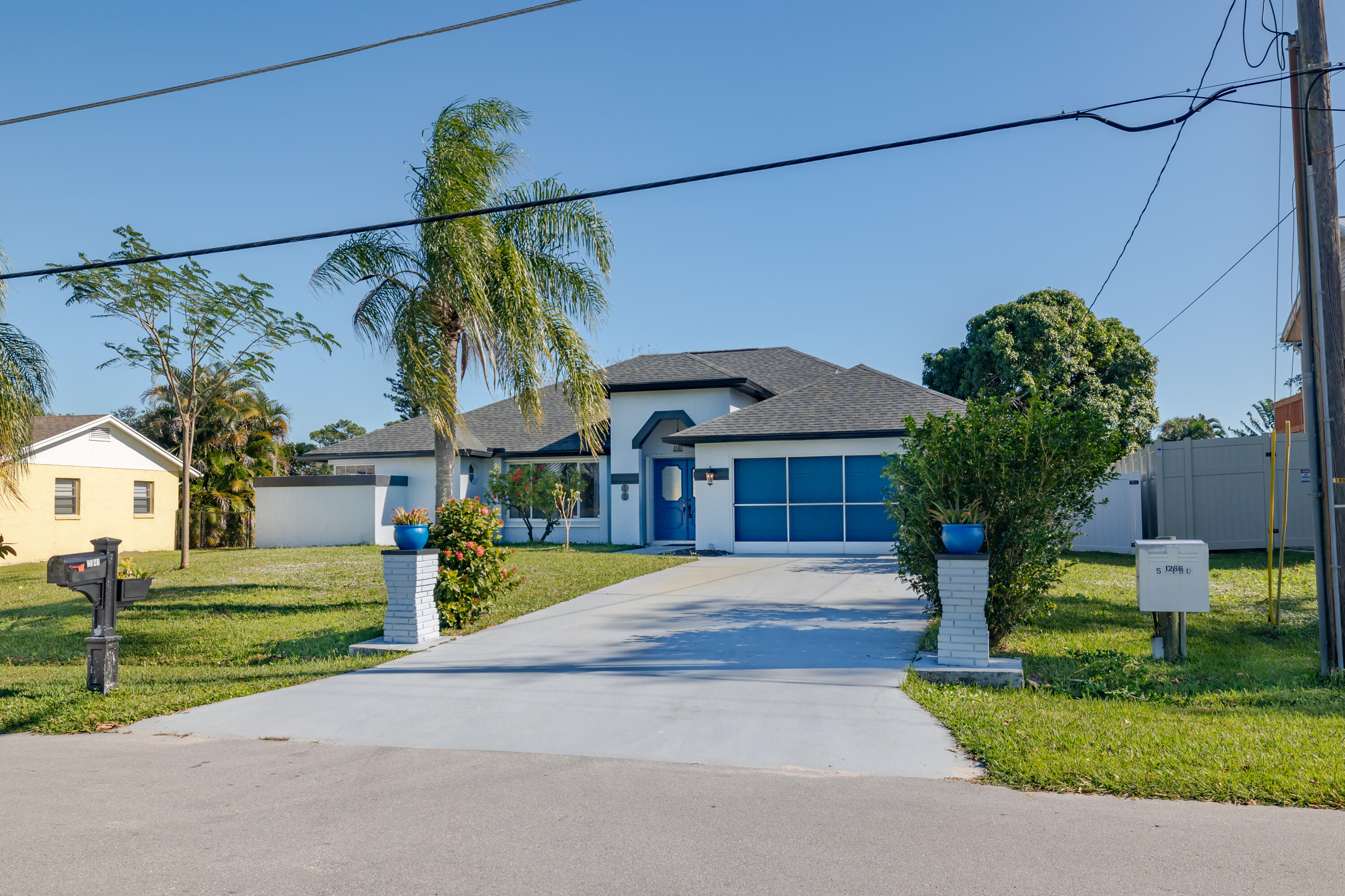 2349 Southeast Pinero Road Port St. Lucie, FL 34952 - Photo 3 of 54 Driveway