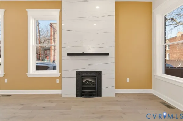 a view of a livingroom with a fireplace