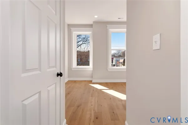 an empty room with windows