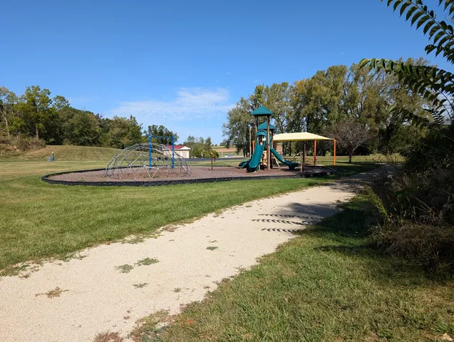 a view of a park with slide