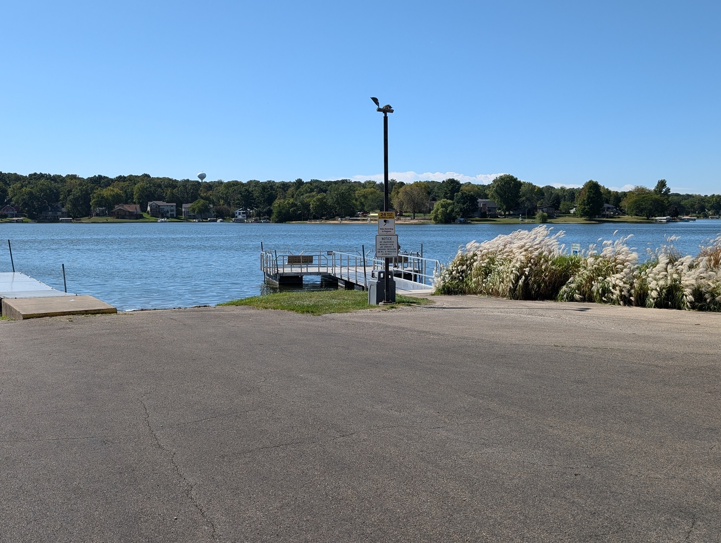 209 Lake Summerset Road Lake Summerset, IL 61019 - Photo 5 of 28 a view of a lake with a house and a big yard