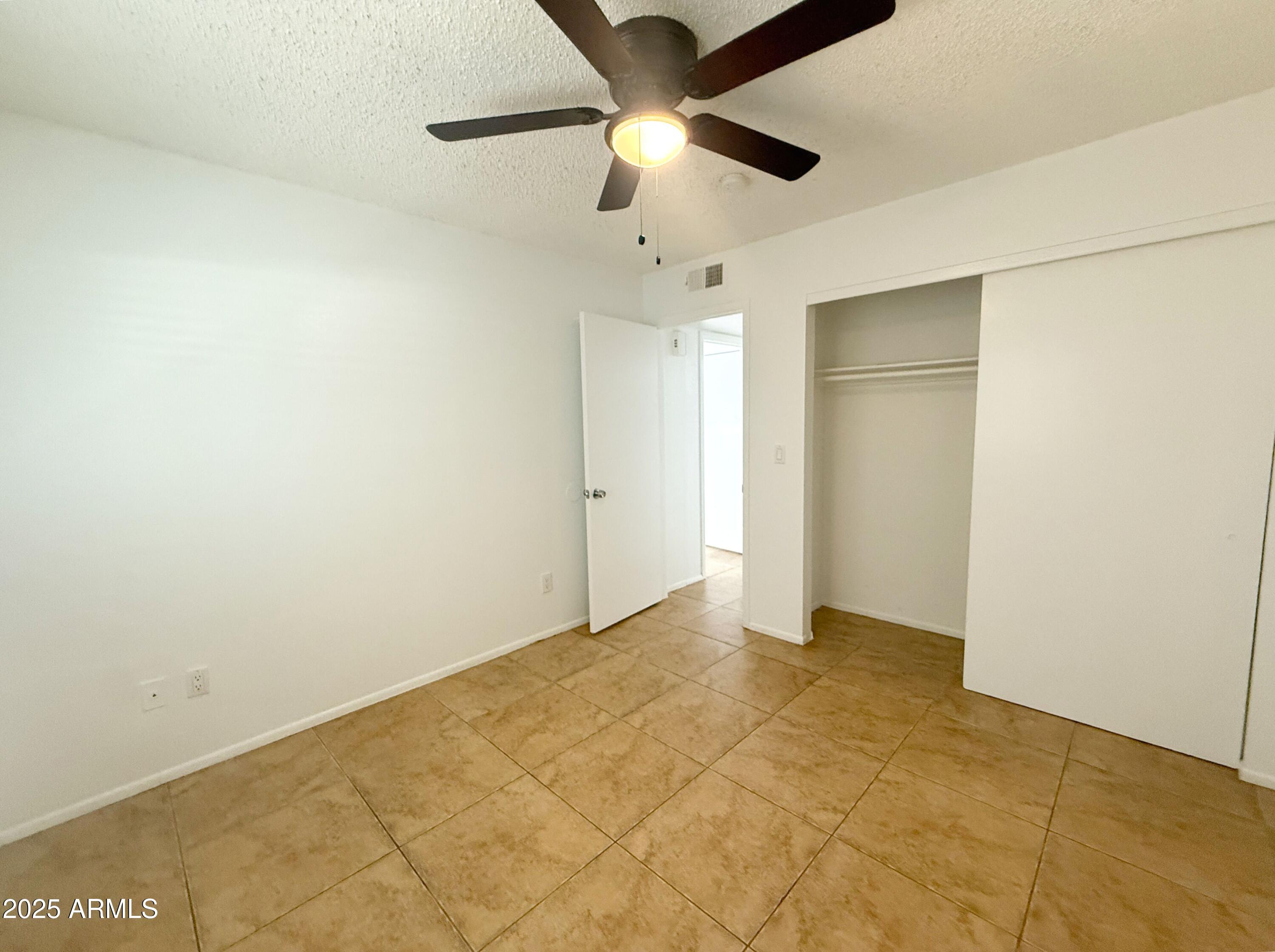 498 East Mesquite Avenue, Unit 4 Apache Junction, AZ 85119 - Photo 12 of 13 a view of an empty room