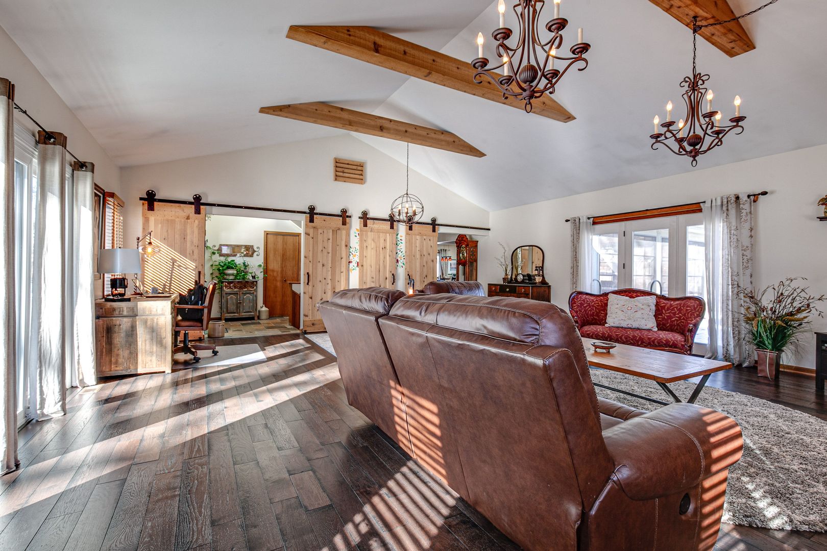 700 West Center Road Palatine, IL 60074 - Photo 4 of 32 a living room with furniture a chandelier and a dining table