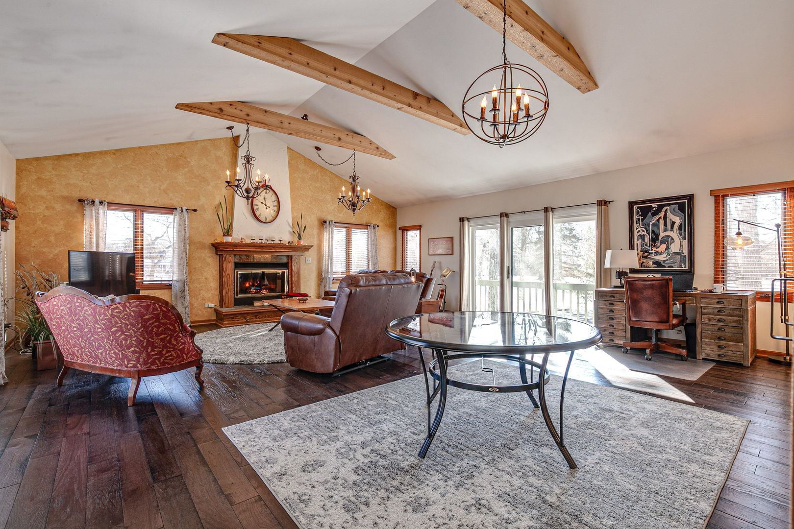 700 West Center Road Palatine, IL 60074 - Photo 6 of 32 a living room with furniture a fireplace and a table