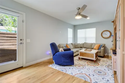 a bathroom with a tub shower and vanity