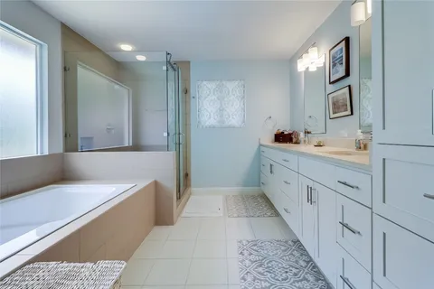 a living room with furniture a rug and a window