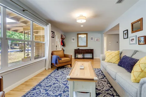 a kitchen with stainless steel appliances granite countertop sink refrigerator and microwave