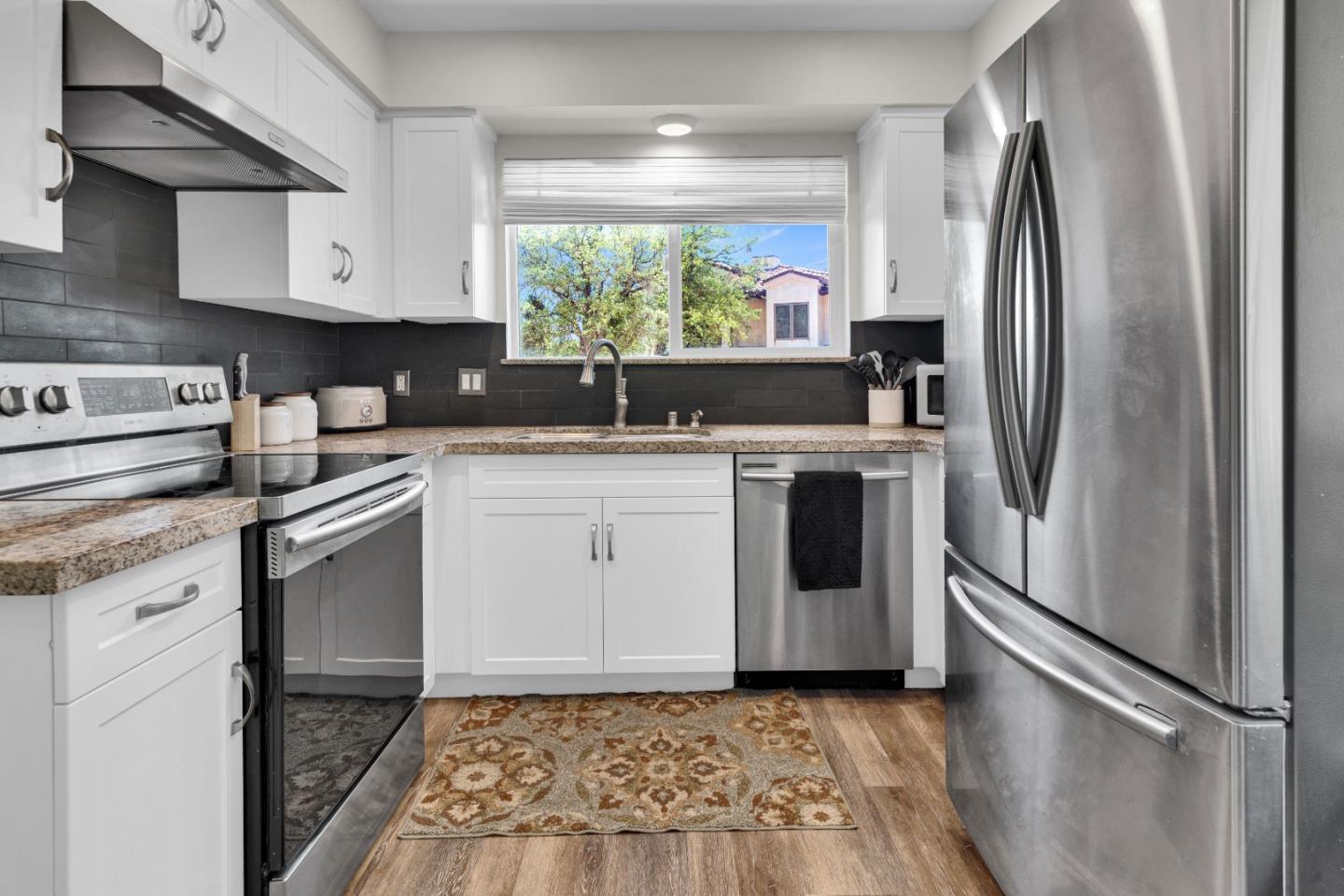 2182 Ridge Rider Road Bradley, CA 93426 - Photo 11 of 37 a kitchen with a refrigerator sink and stove