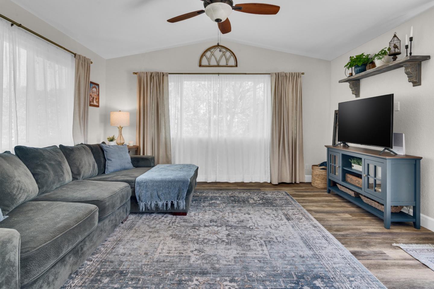 2182 Ridge Rider Road Bradley, CA 93426 - Photo 14 of 37 a living room with furniture and a flat screen tv