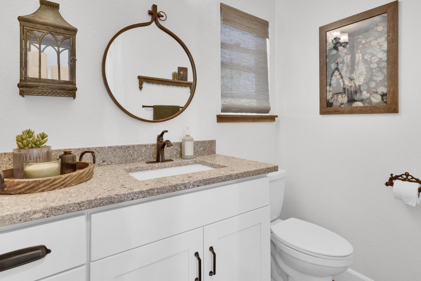 2182 Ridge Rider Road Bradley, CA 93426 - Photo 17 of 37 a bathroom with a toilet a sink and mirror