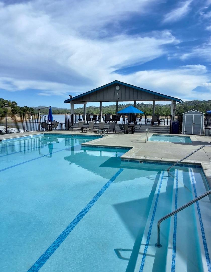 2182 Ridge Rider Road Bradley, CA 93426 - Photo 28 of 37 a view of a swimming pool with an outdoor seating