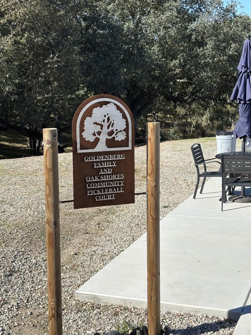 2182 Ridge Rider Road Bradley, CA 93426 - Photo 34 of 37 a wooden bench sitting in front of a building