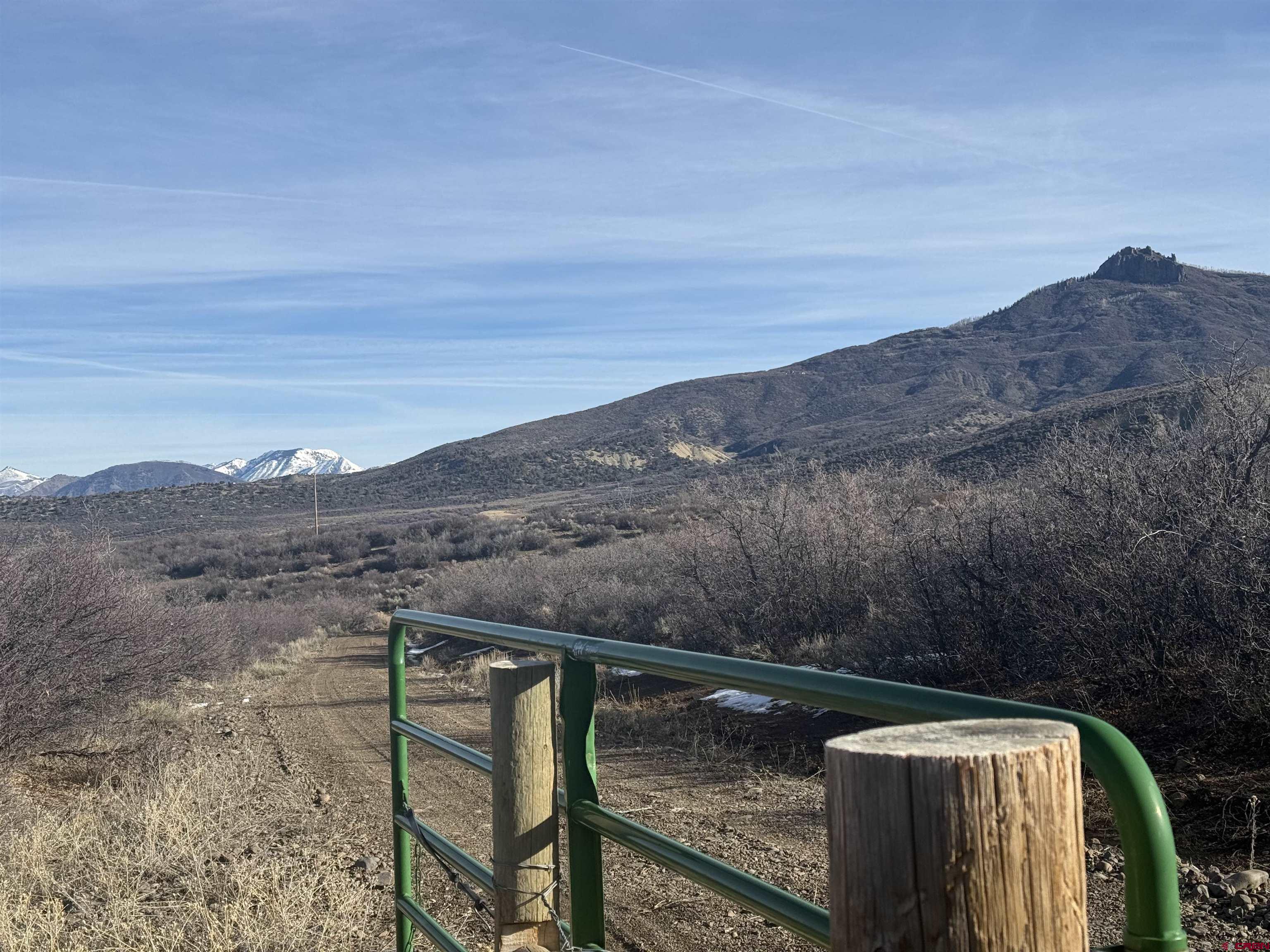 Tbd 8250th Road Crawford, CO 81415 - Photo 38 of 45 a view of a lake with a mountain in the background