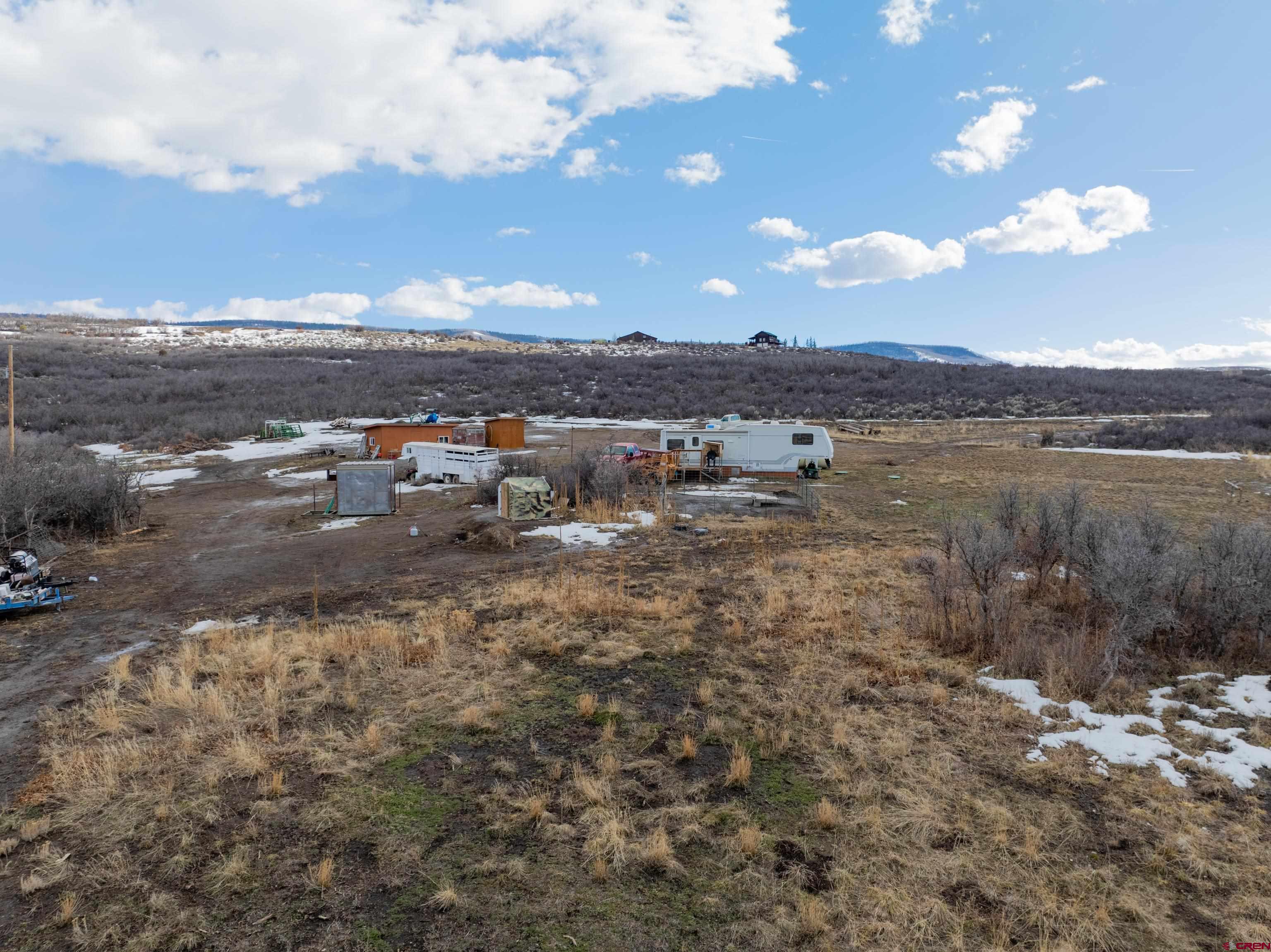 Tbd 8250th Road Crawford, CO 81415 - Photo 45 of 45 a view of a lake with houses in back