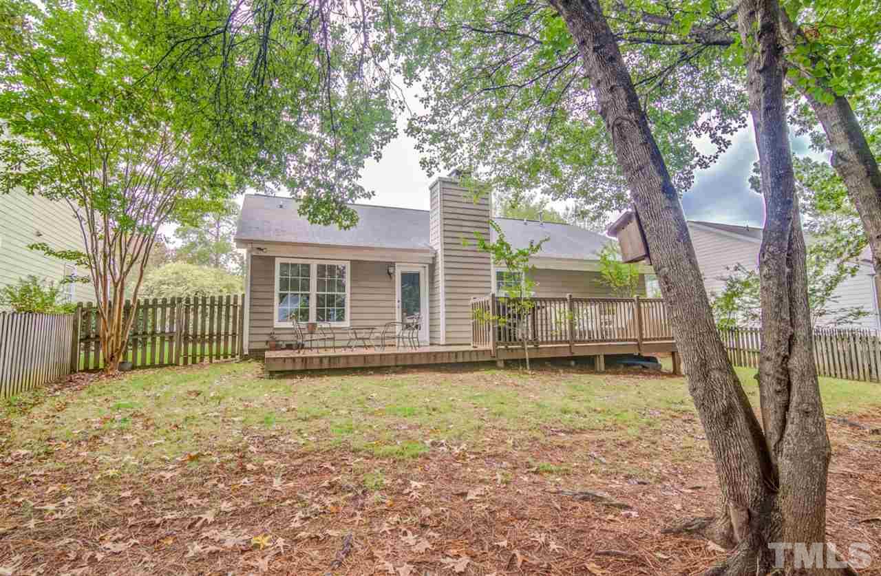 8640 Harps Mill Road Raleigh, NC 27615 - Photo 23 of 23 a view of a house with a yard