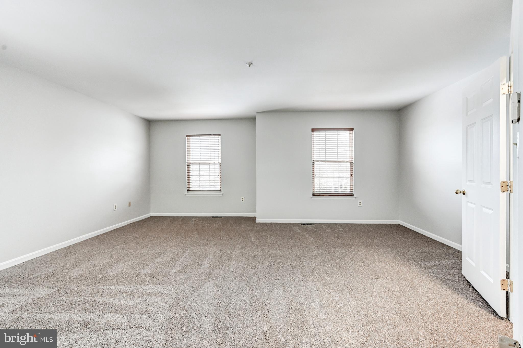 300 Roff Point Drive Odenton, MD 21113 - Photo 13 of 28 an empty room with windows