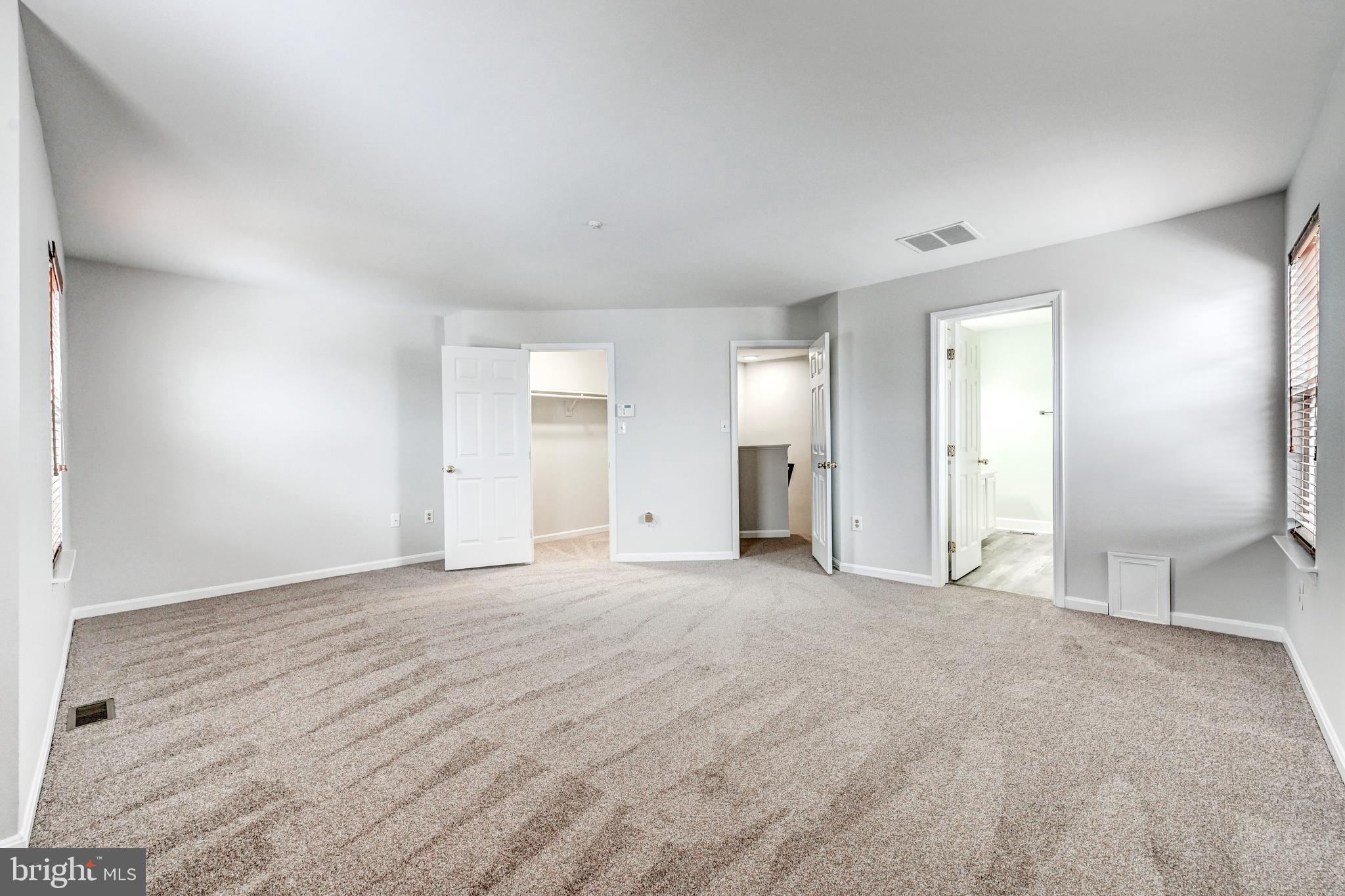 300 Roff Point Drive Odenton, MD 21113 - Photo 16 of 28 a view of empty room with window and wooden floor