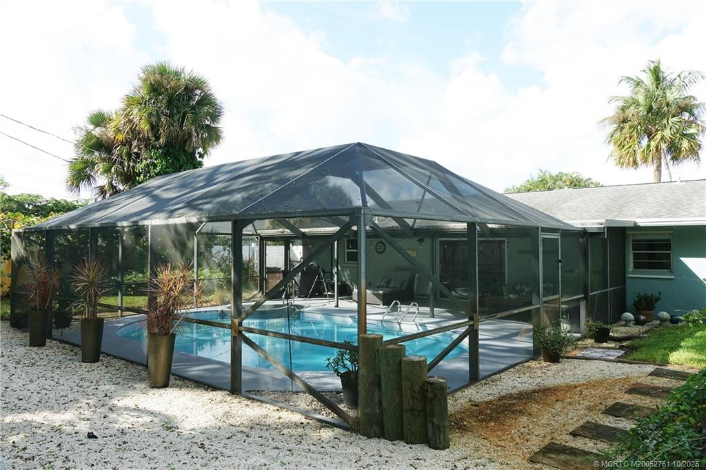 905 Southeast Flamingo Avenue Stuart, FL 34996 - Photo 29 of 36 a view of outdoor space yard deck and patio