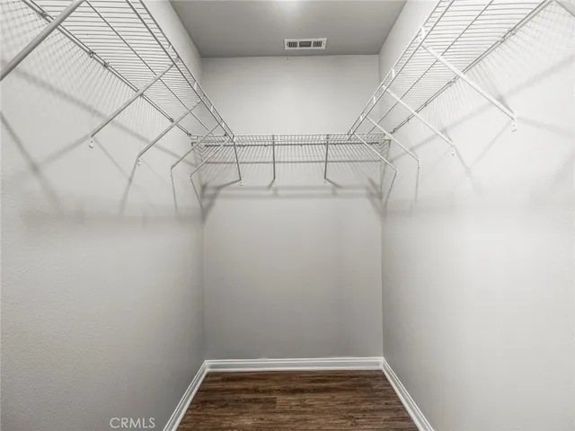 a view of a room with racks on the wall