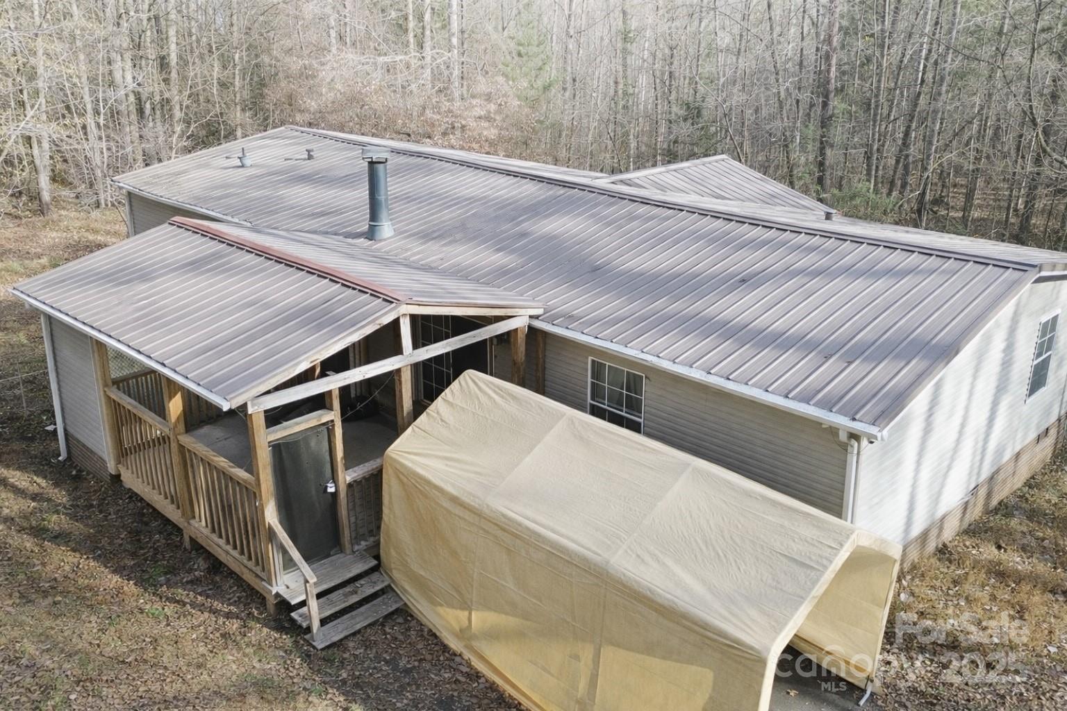 3215 Shadybark Trail Catawba, SC 29704 - Photo 33 of 36 a roof deck with table and chairs