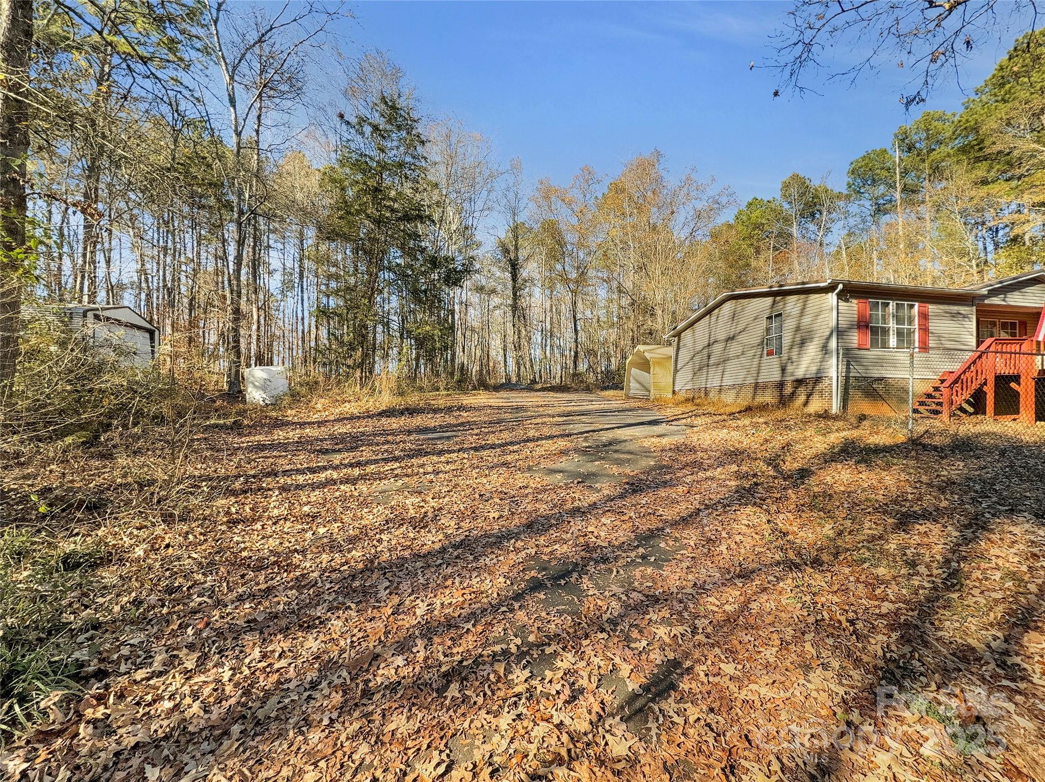 3215 Shadybark Trail Catawba, SC 29704 - Photo 36 of 36 a backyard of a house with lots of green space