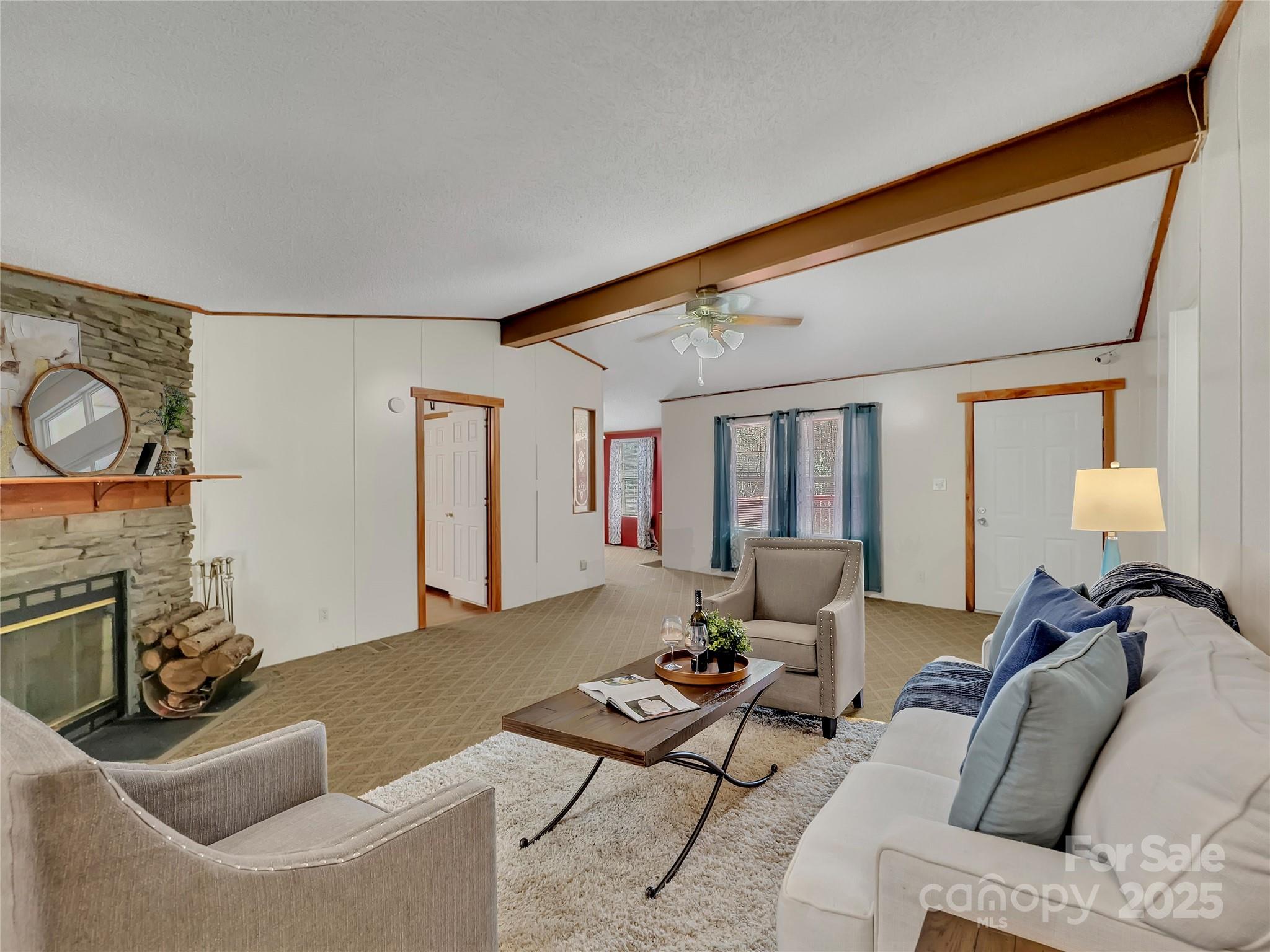 3215 Shadybark Trail Catawba, SC 29704 - Photo 5 of 36 a living room with furniture and a fireplace