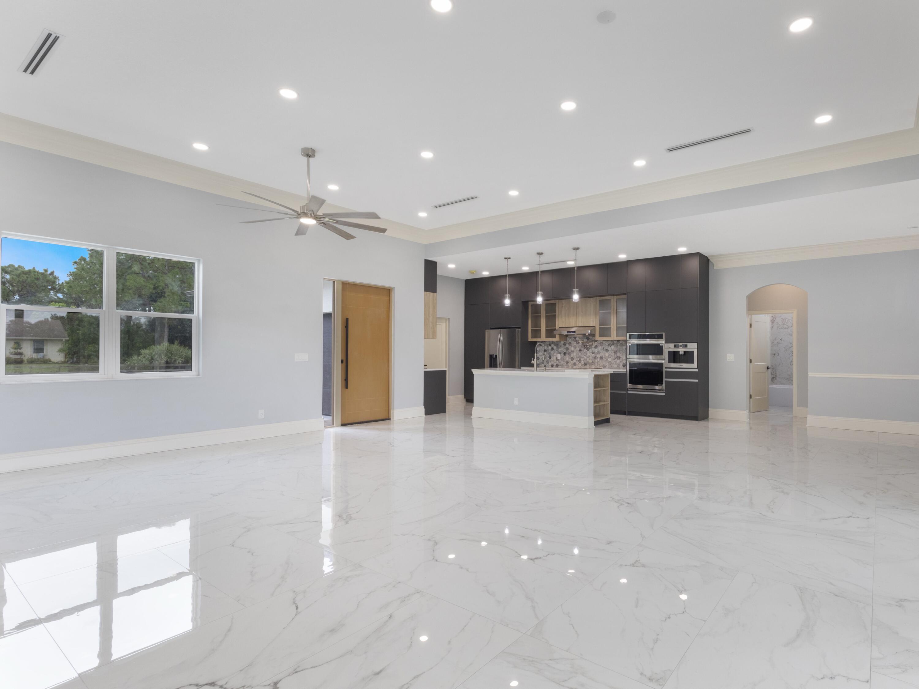17436 71st Lane North Loxahatchee, FL 33470 - Photo 25 of 50 a view of kitchen with furniture and window