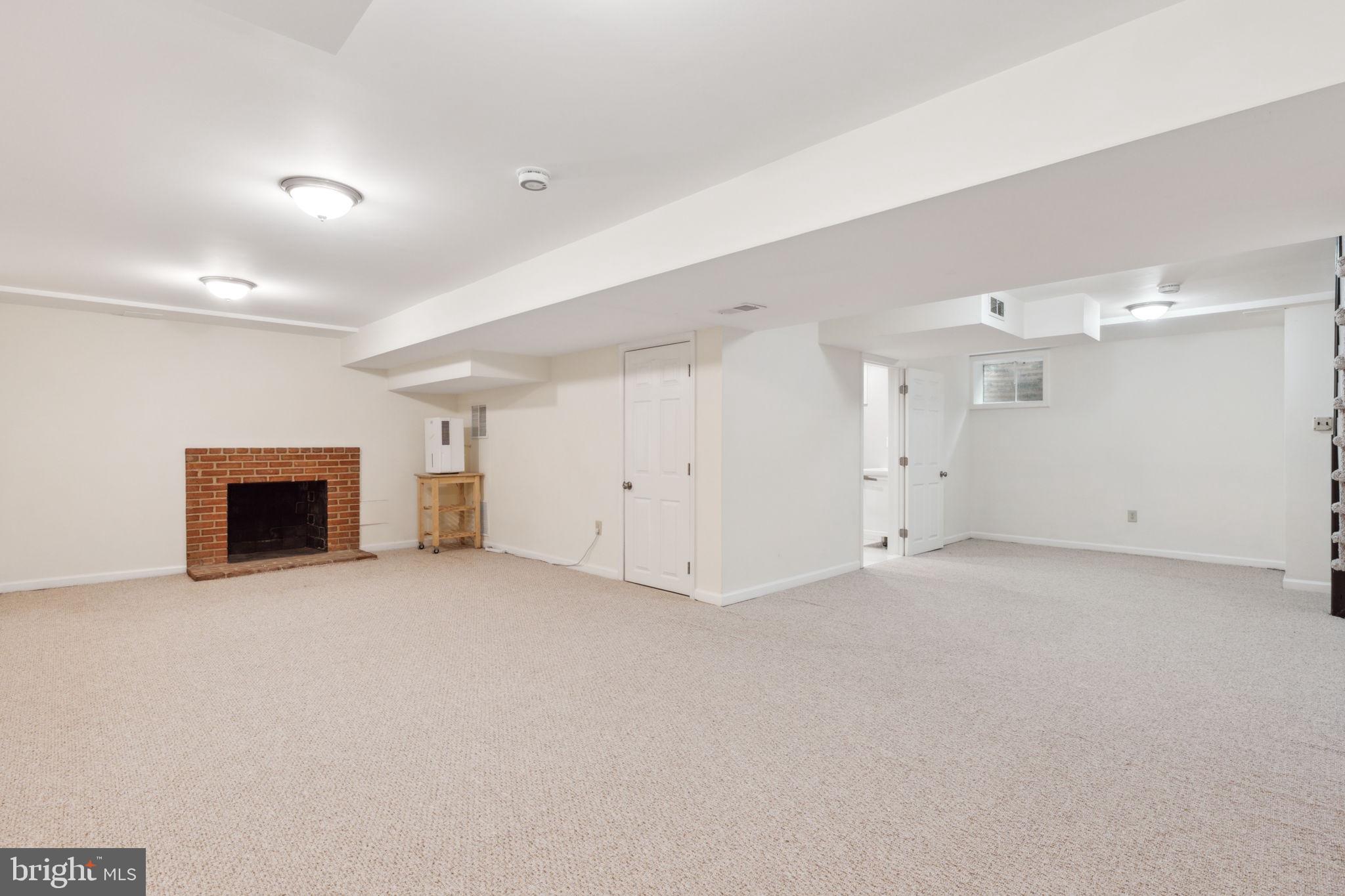 5910 Overlea Road Bethesda, MD 20816 - Photo 39 of 50 Fully Finished Basement with 2nd Fireplace