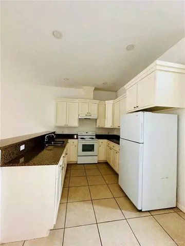 a view of a room with an empty space