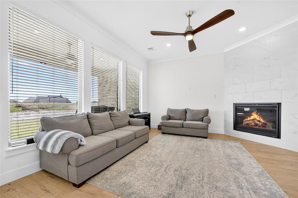 209 Basalt Lane Azle, TX 76020 - Photo 15 of 39 a living room with furniture and a large window