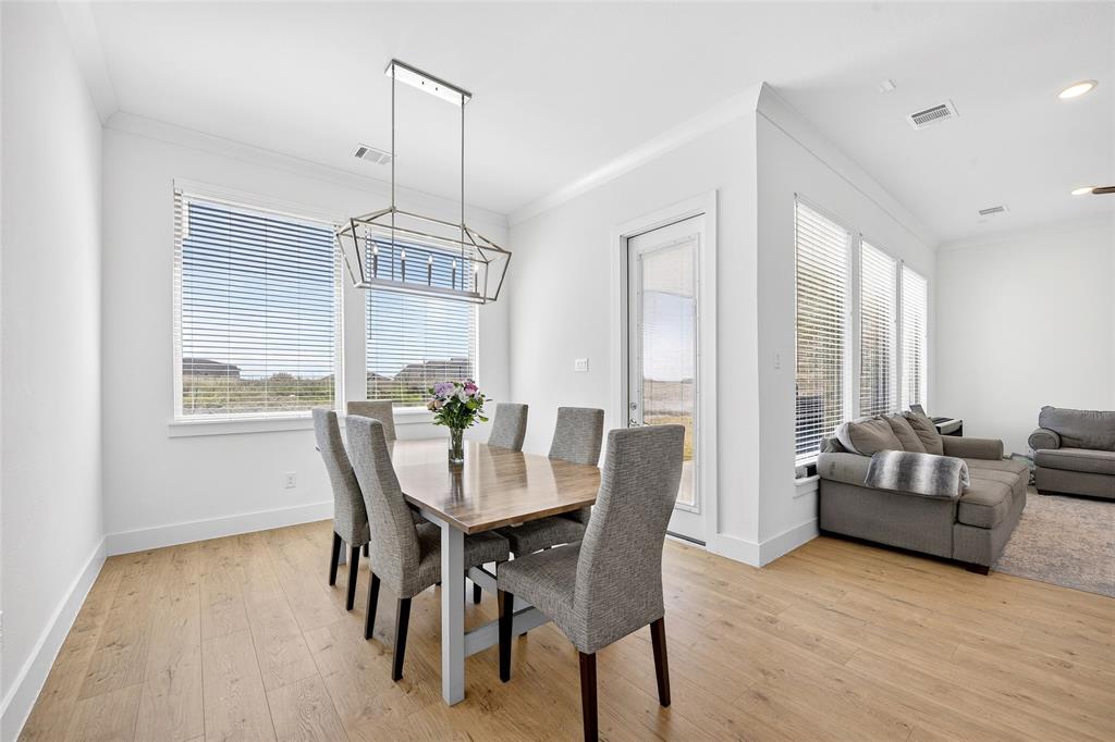 209 Basalt Lane Azle, TX 76020 - Photo 22 of 39 a view of a dining room with furniture window and outside view