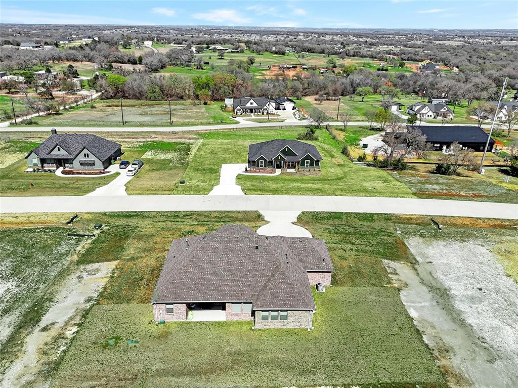 209 Basalt Lane Azle, TX 76020 - Photo 36 of 39 an aerial view of a house with a yard