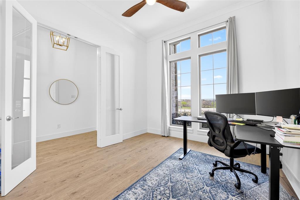 209 Basalt Lane Azle, TX 76020 - Photo 8 of 39 a workspace with wooden floor and a window