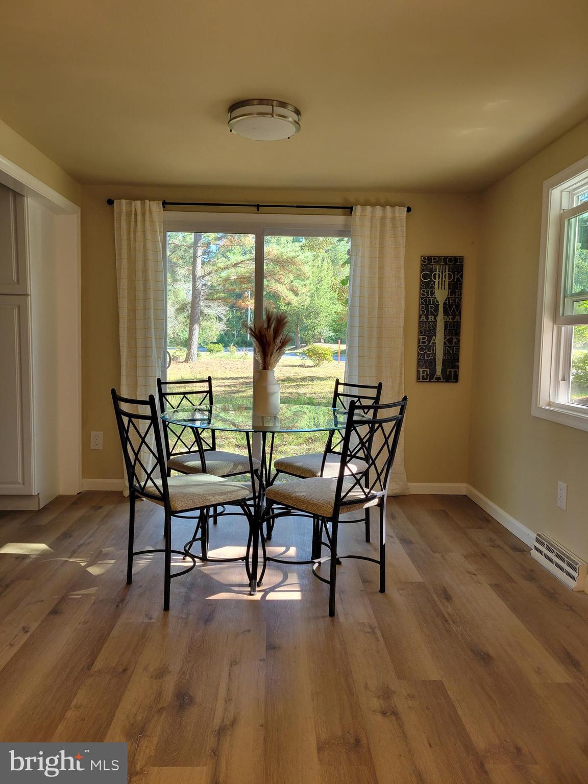 201 Grainery Road Montross, VA 22520 - Photo 3 of 9 a dining room with furniture and window