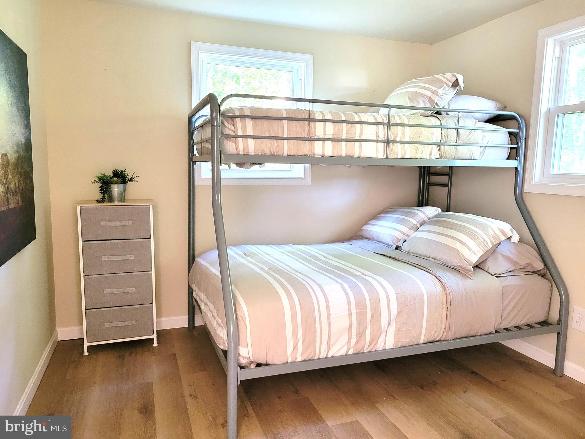 201 Grainery Road Montross, VA 22520 - Photo 7 of 9 a bedroom with a bed and window