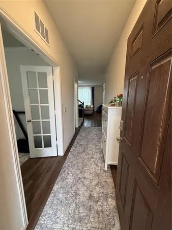 a view of a refrigerator in a house