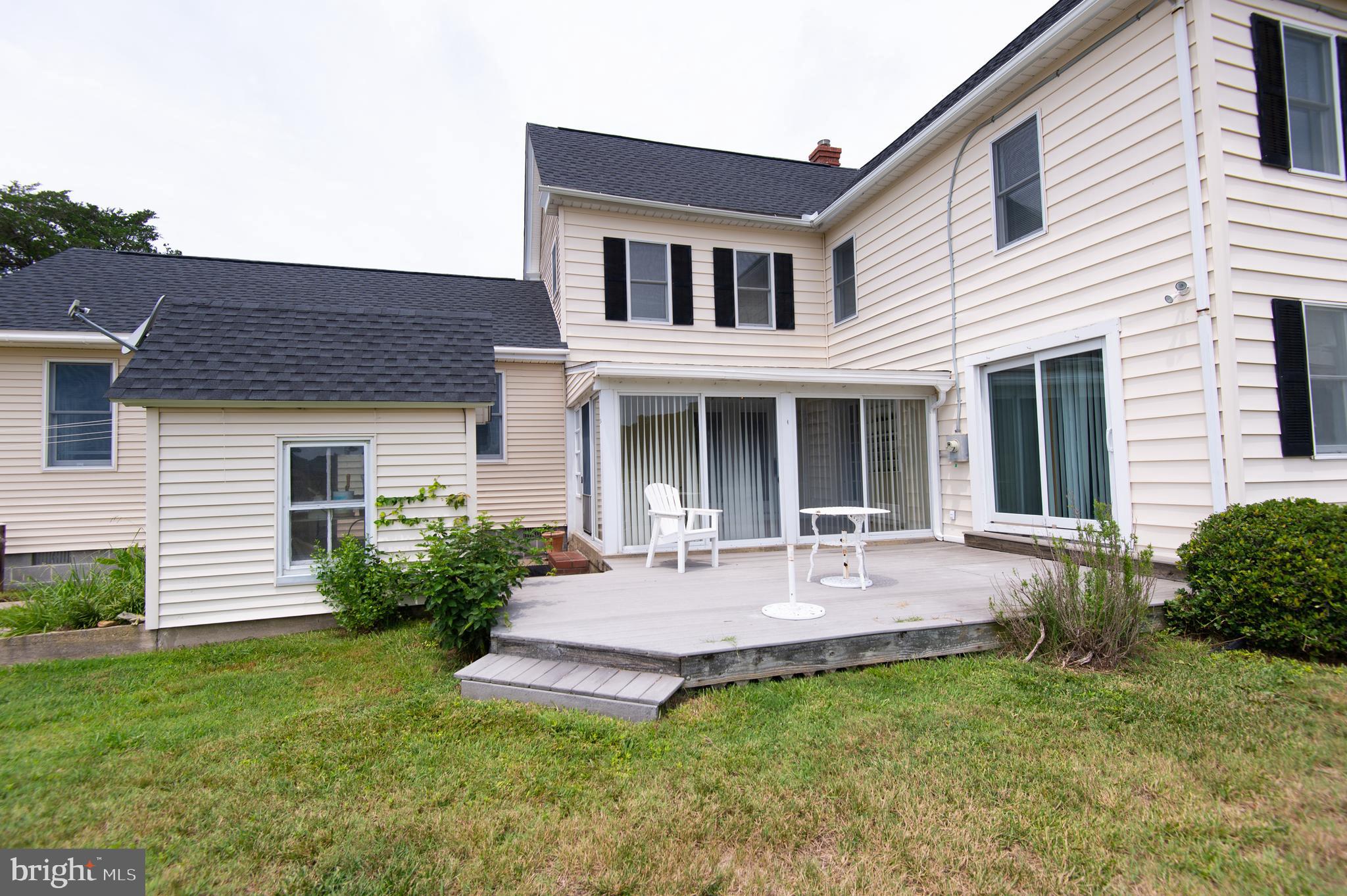 6046 Todds Point Road Cambridge, MD 21613 - Photo 10 of 94 View of Side Deck to Sunroom & Bedroom #1