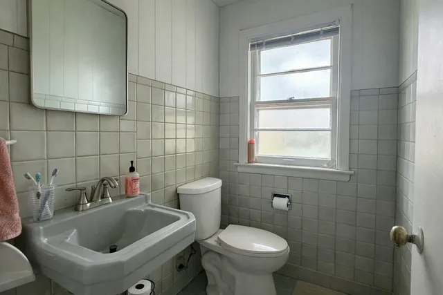 a bathroom with a sink and a toilet