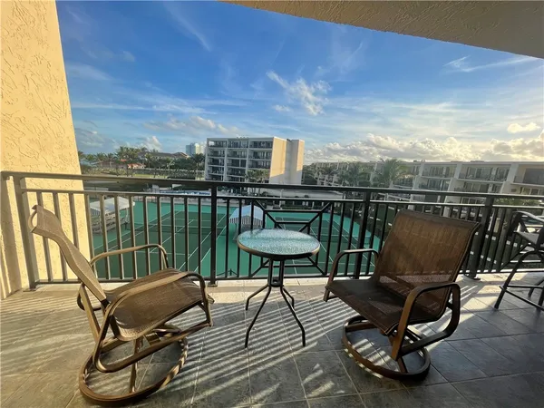 a view of a chairs in the roof deck