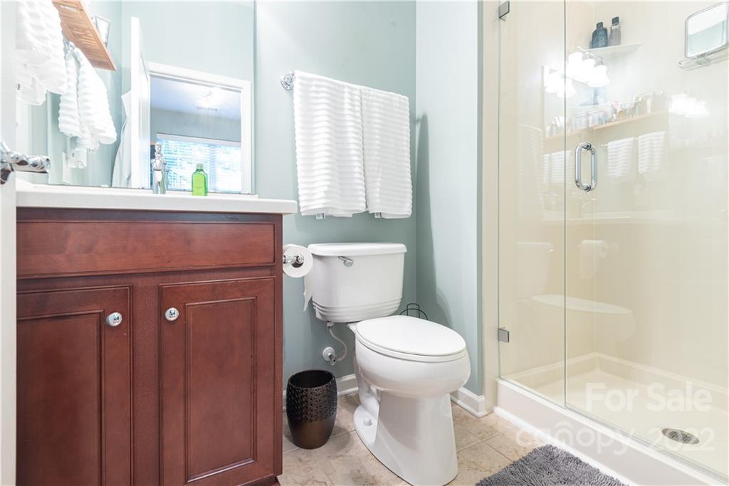 1132 Drayton Court, Unit 130 Fort Mill, SC 29708 - Photo 19 of 24 a bathroom with a toilet and a shower