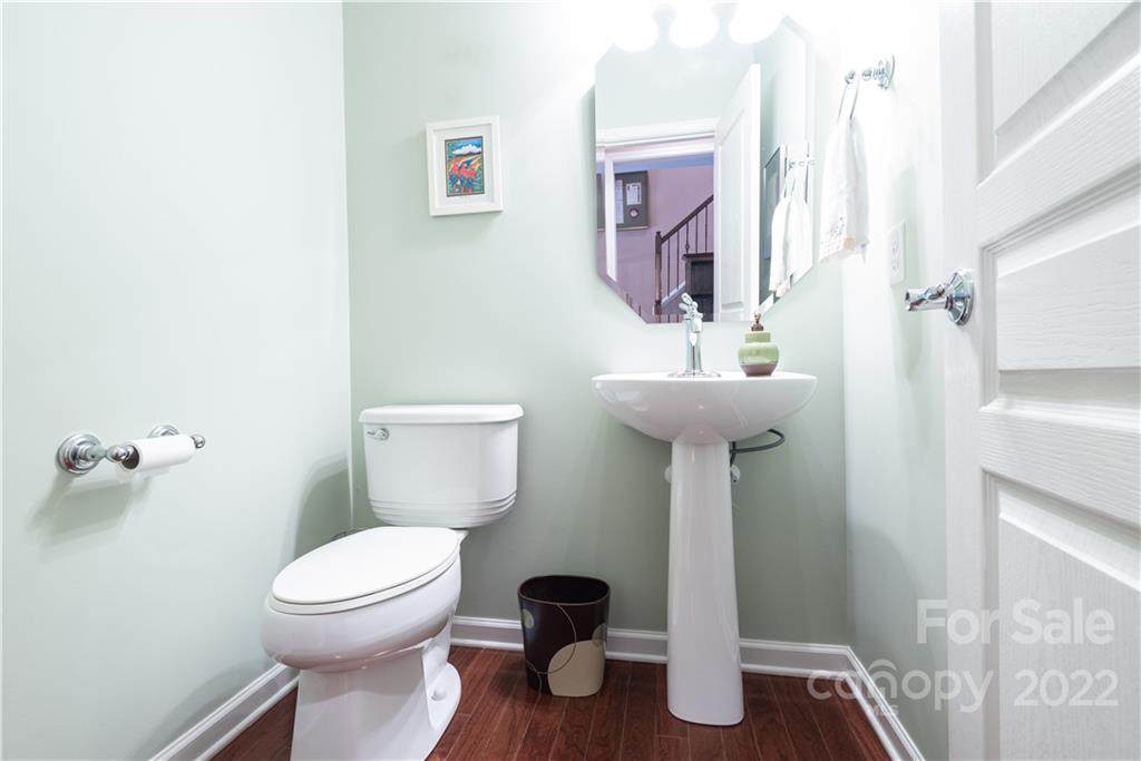 1132 Drayton Court, Unit 130 Fort Mill, SC 29708 - Photo 8 of 24 a bathroom with a toilet sink and mirror