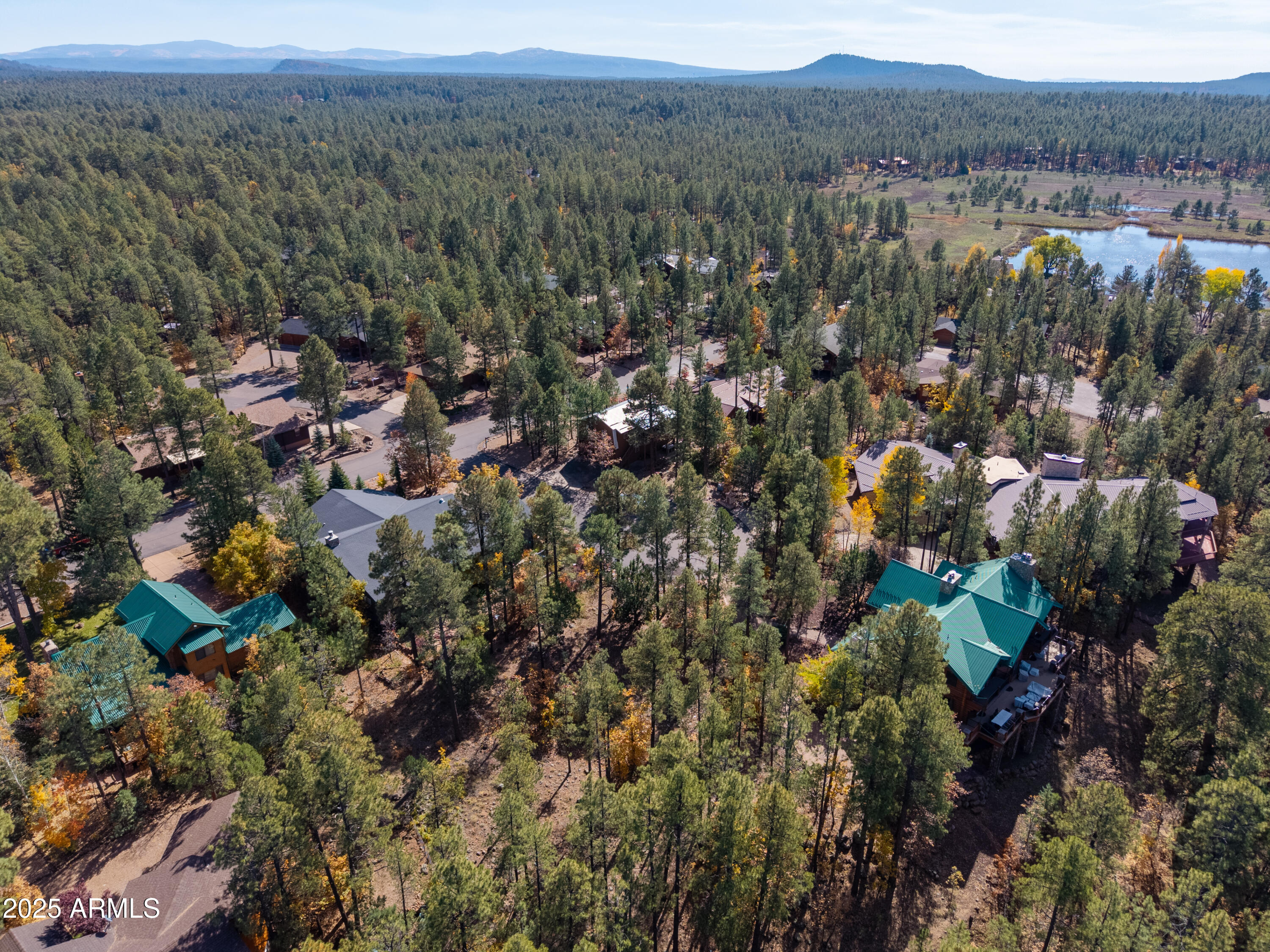2189 Creekside Court, Unit 19 Pinetop, AZ 85935 - Photo 8 of 15 a view of a city with mountain