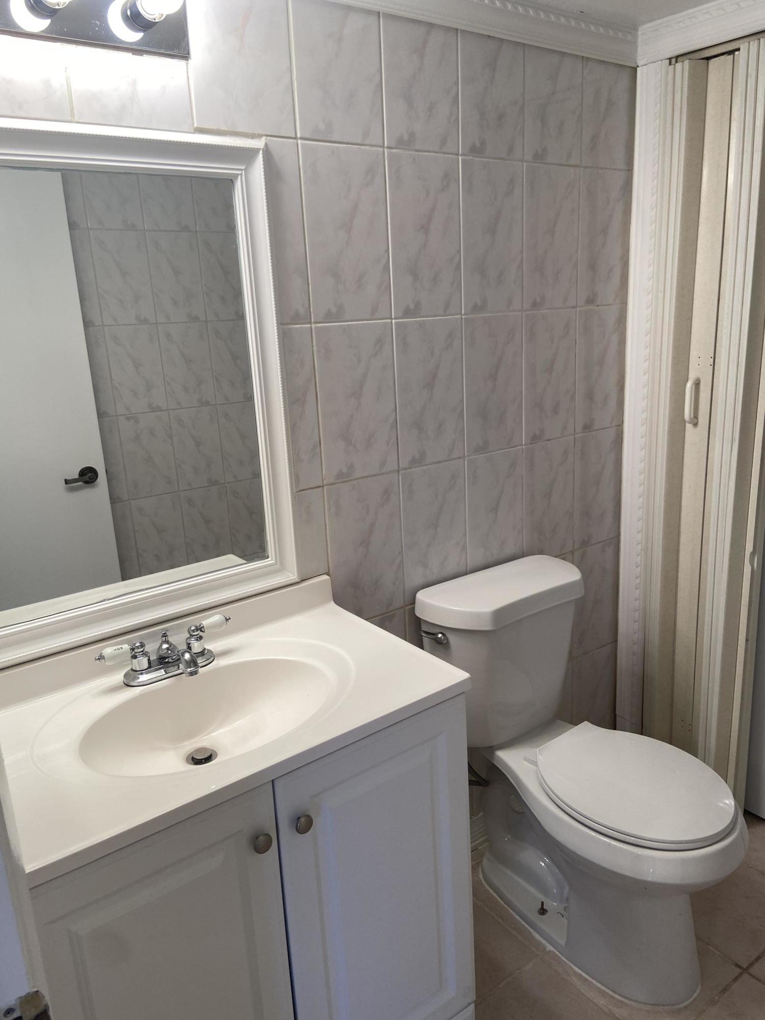 8541 Boca Rio Drive Boca Raton, FL 33433 - Photo 12 of 28 Downstairs Bath