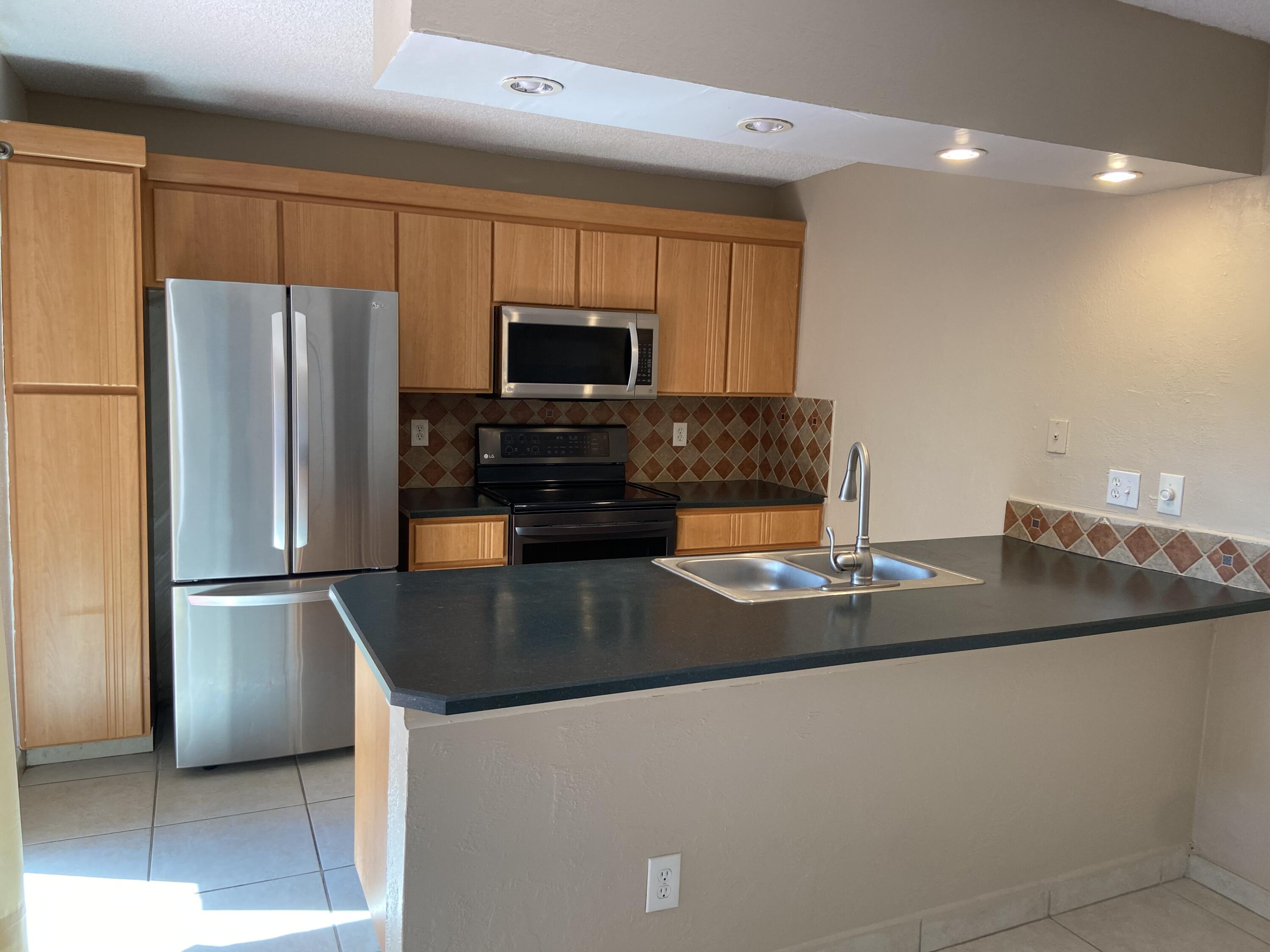 8541 Boca Rio Drive Boca Raton, FL 33433 - Photo 9 of 28 kitchen