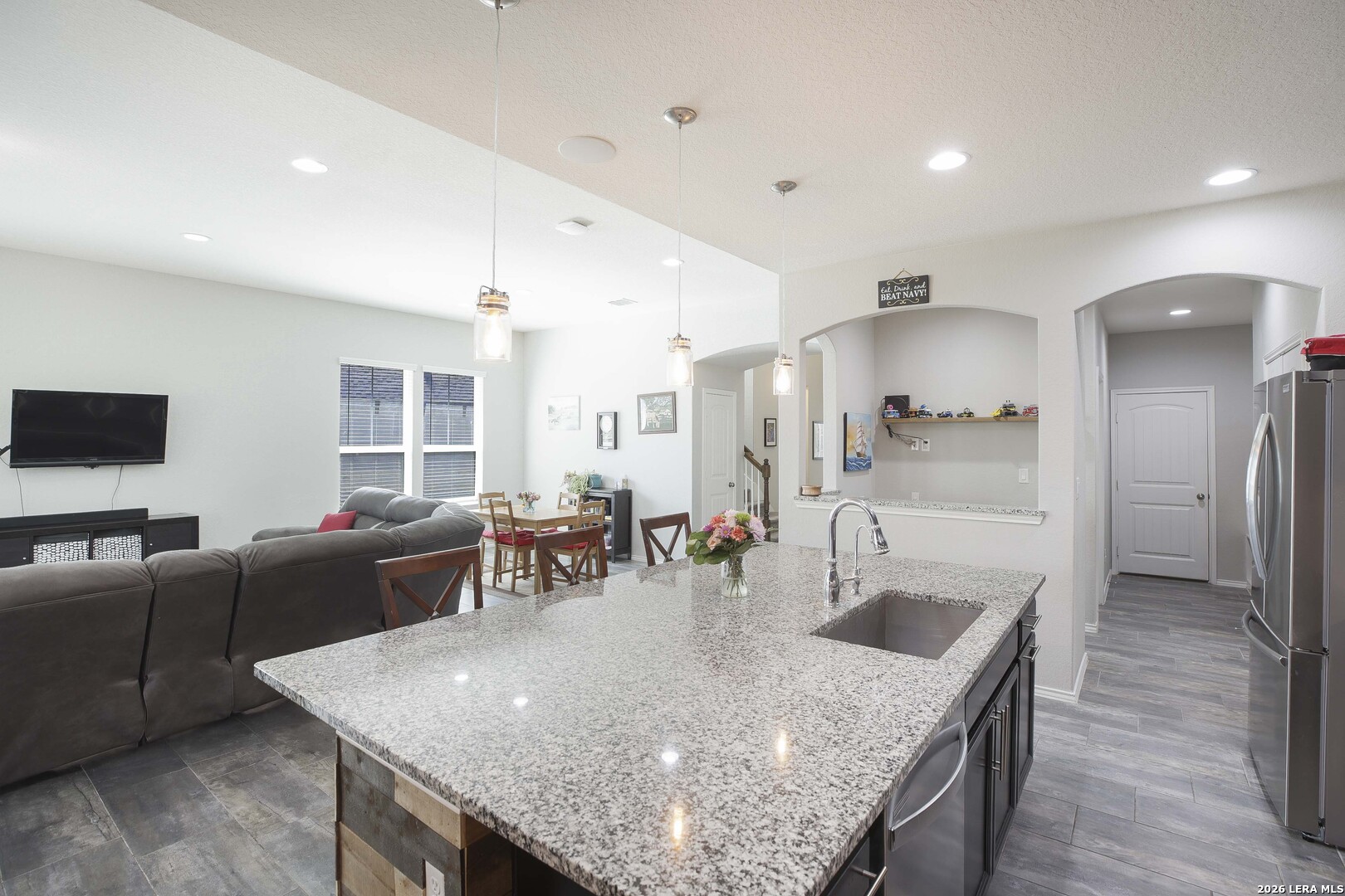 11638 Chalk Stem Schertz, TX 78154 - Photo 12 of 37 a kitchen with granite countertop a sink a counter top space and stainless steel appliances