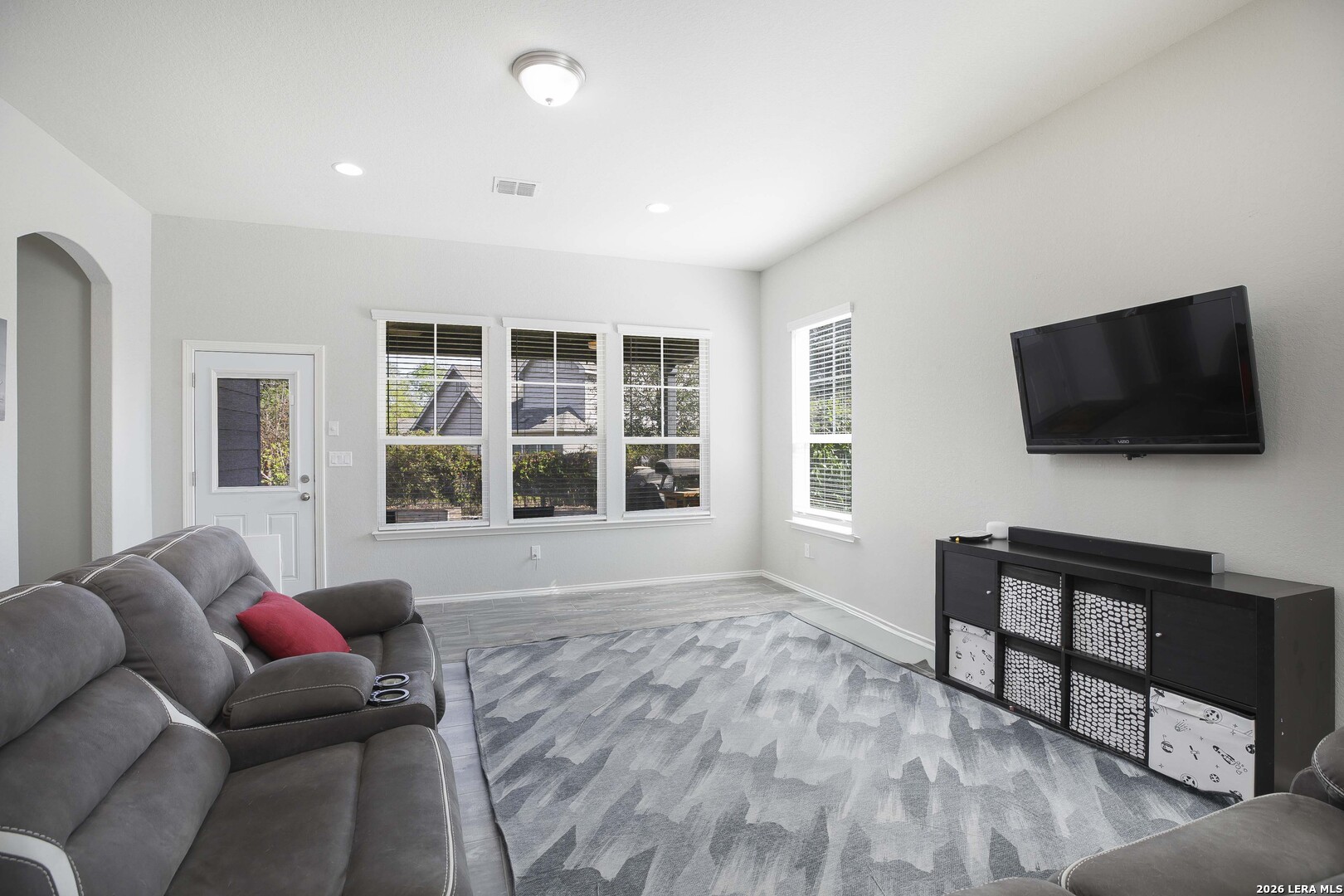 11638 Chalk Stem Schertz, TX 78154 - Photo 14 of 37 a living room with furniture and a flat screen tv