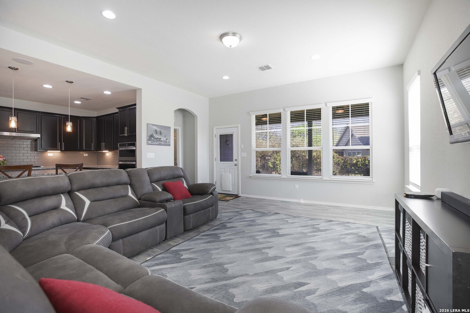 11638 Chalk Stem Schertz, TX 78154 - Photo 15 of 37 a living room with furniture and a flat screen tv