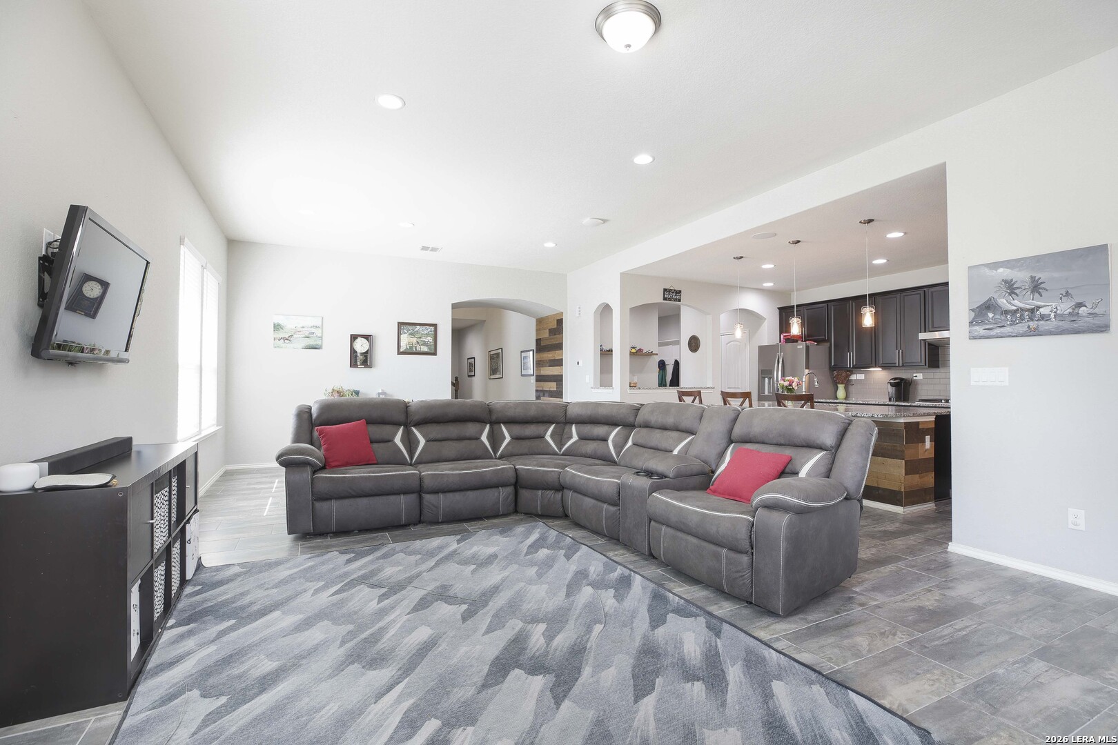 11638 Chalk Stem Schertz, TX 78154 - Photo 16 of 37 a living room with furniture and kitchen view