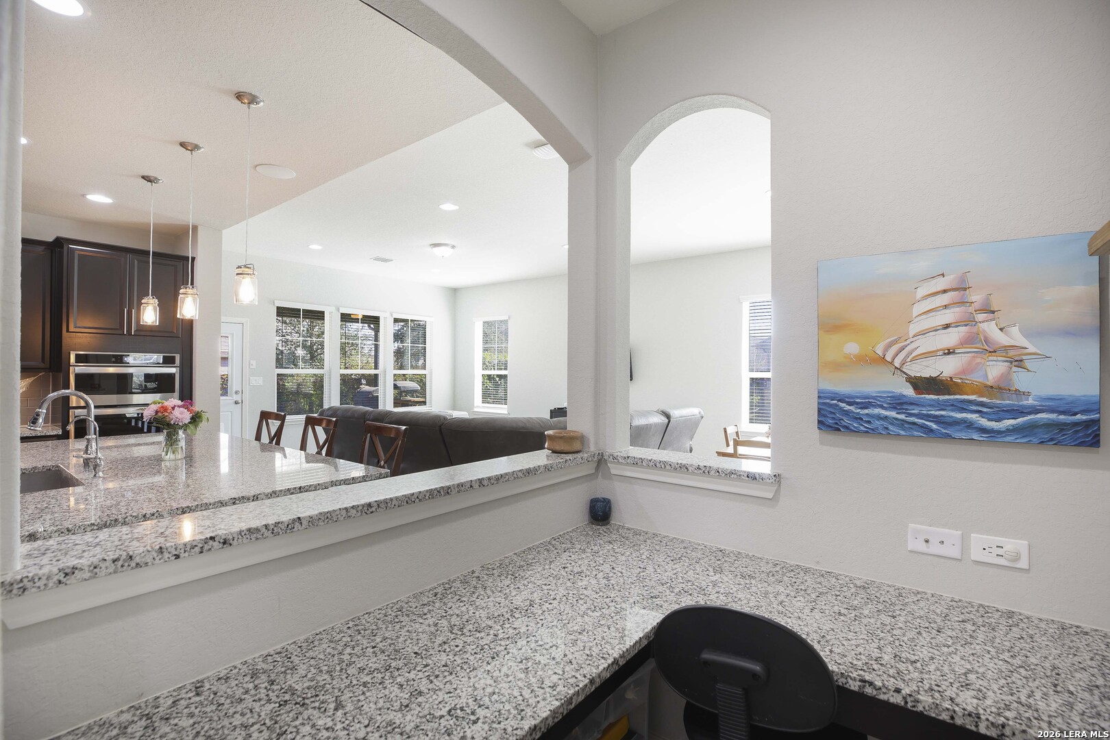 11638 Chalk Stem Schertz, TX 78154 - Photo 17 of 37 a living room with granite countertop kitchen island granite countertop furniture and a large window