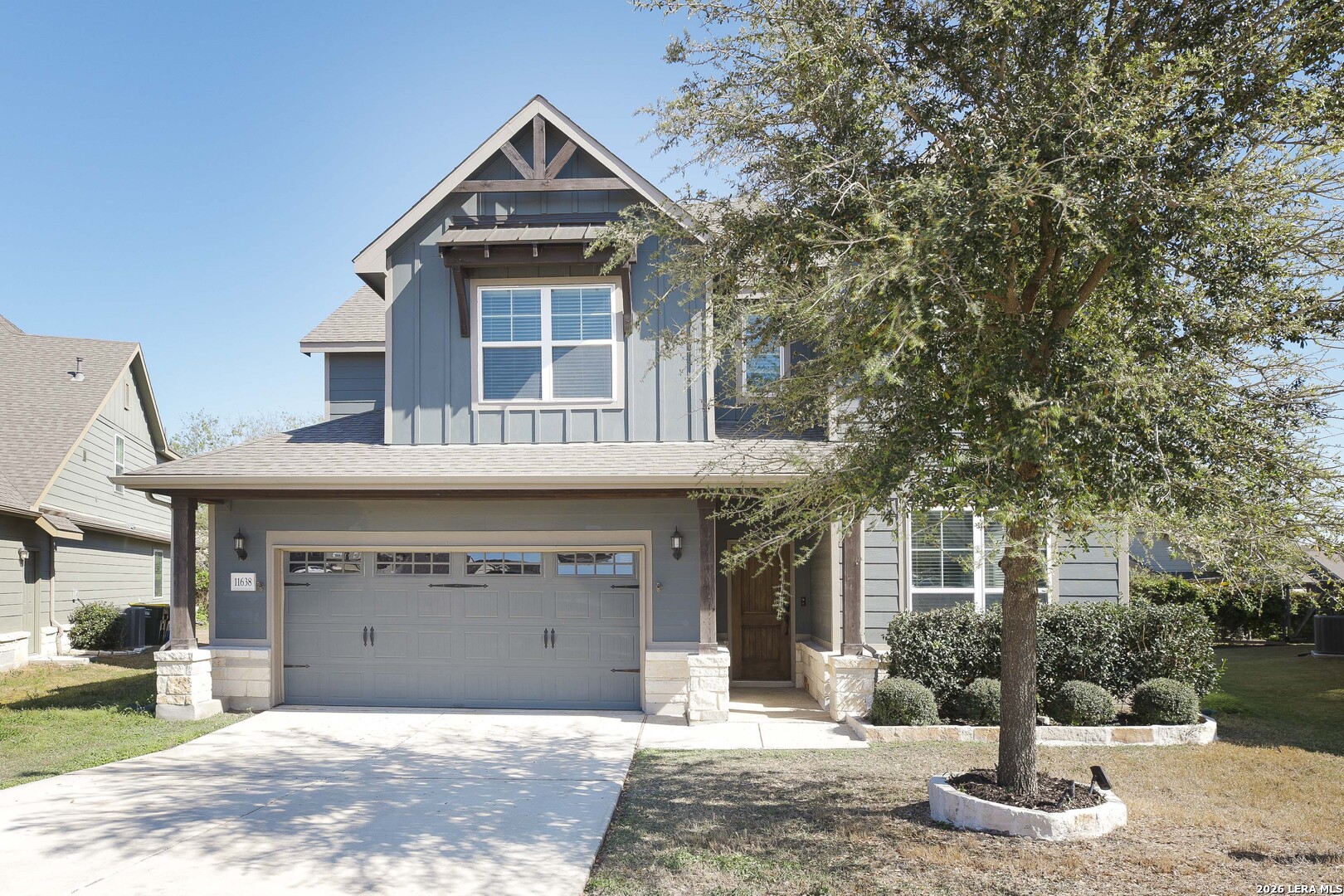 11638 Chalk Stem Schertz, TX 78154 - Photo 2 of 37 a front view of a house with a yard and garage